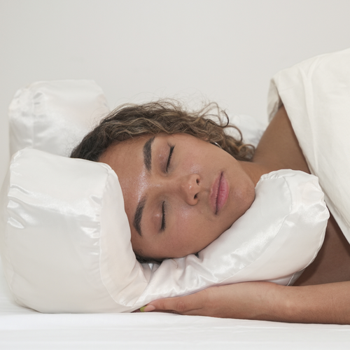 Flawless Face Pillow Cloud — close-up of the four facial cut-outs