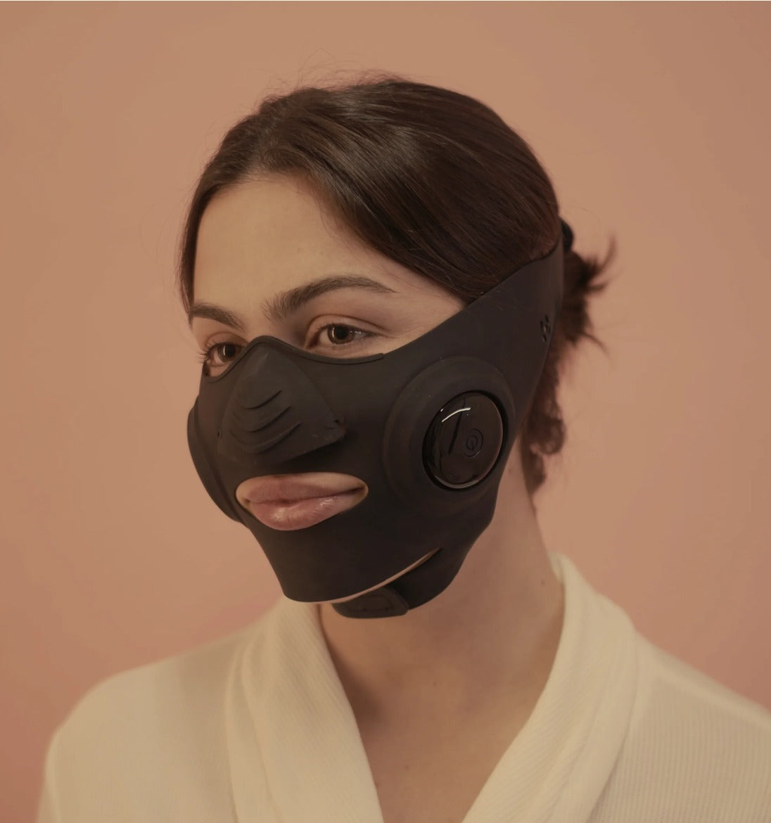 InstaLift EMS Mask worn by a model, front three-quarter view