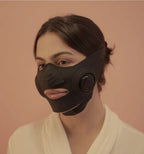 InstaLift EMS Mask worn by a model, front three-quarter view