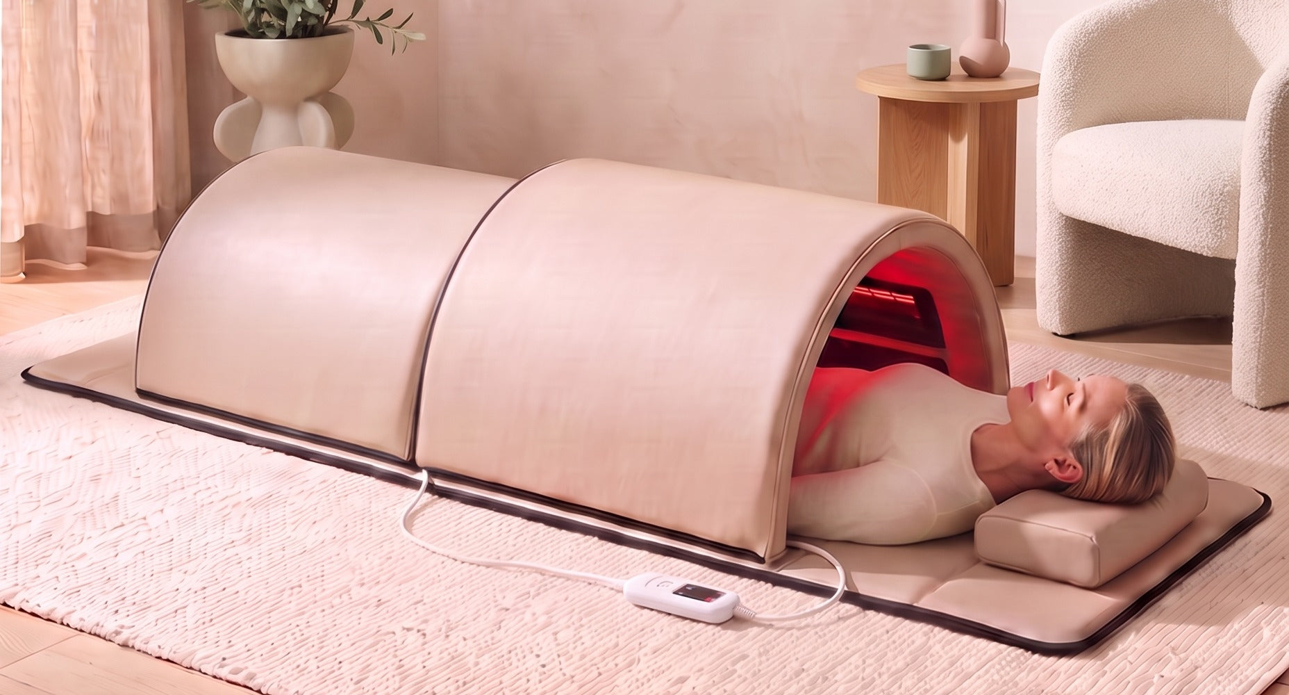 Woman relaxing inside the Infrared Sauna Dome with head outside the larger shell